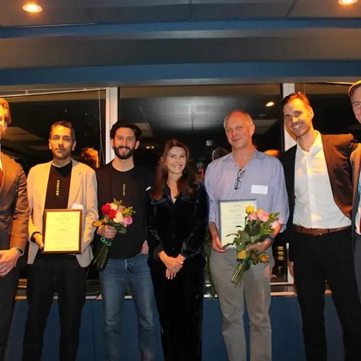 Persons from Northe and SACCNY-Deloitte standing on stage