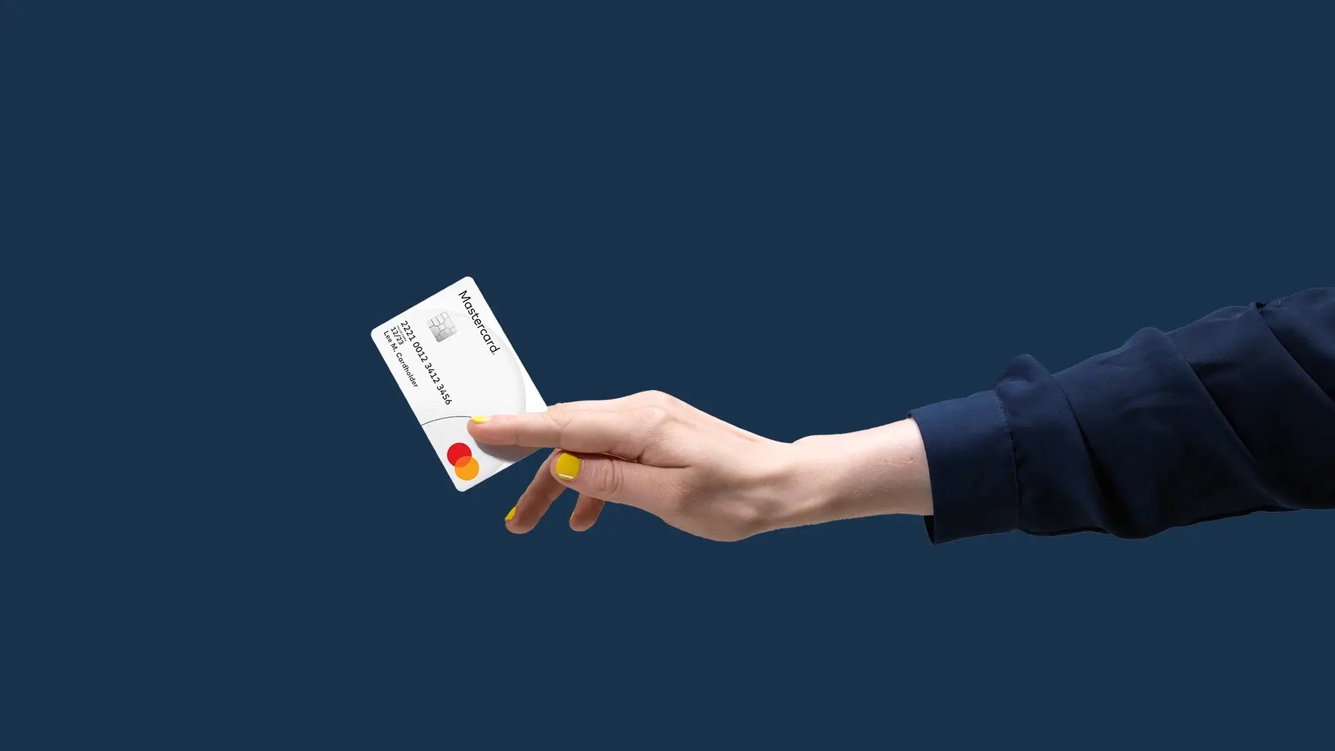 Hand holding payment card blue background