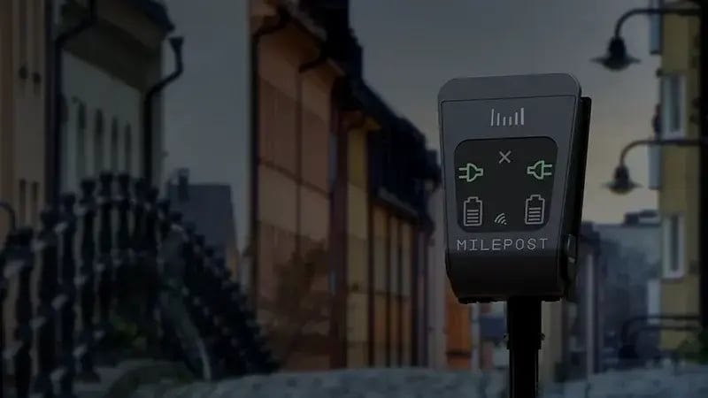 Milepost electric vehicle charging station in an urban street environment