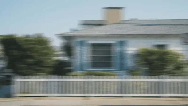 Motion blur of a residential house symbolising movement and everyday mobility