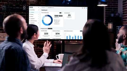 Virta Hub dashboard on a big screen in a meeting