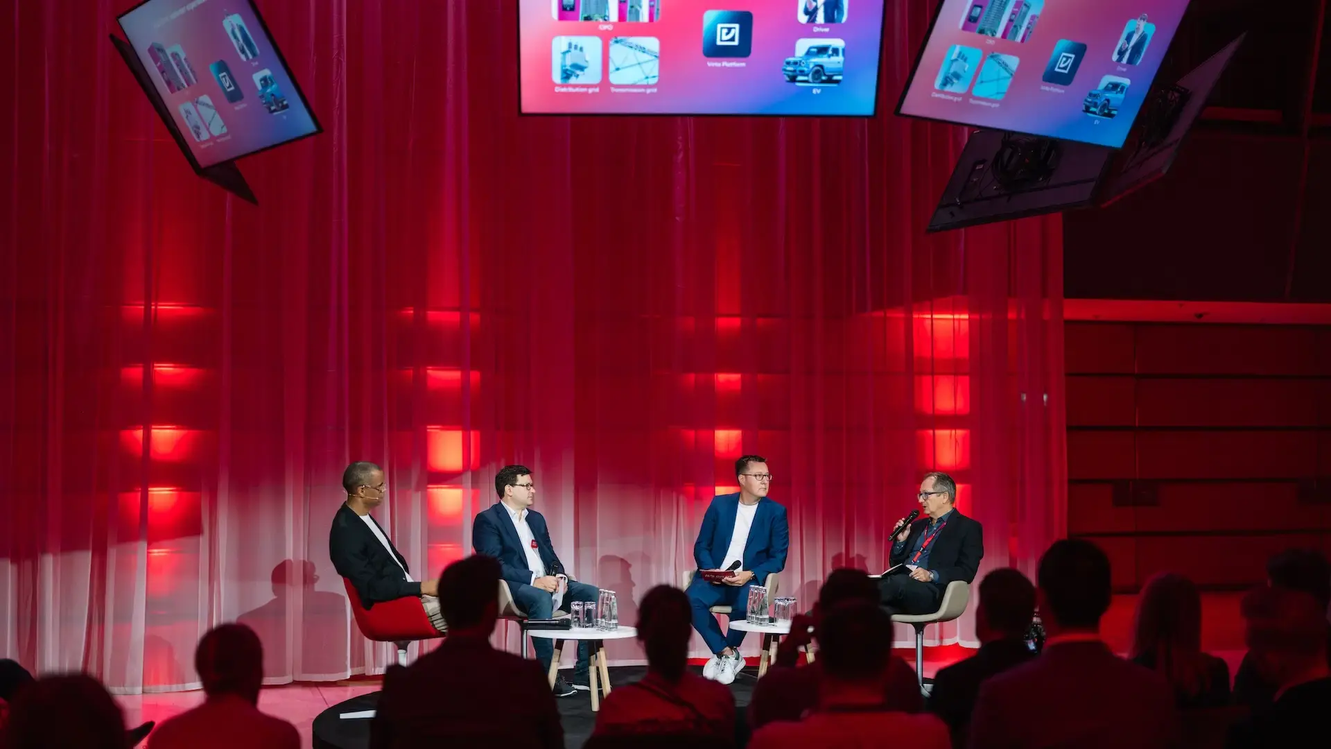 Christian Girardeau, CSO of Virta at NeX25 Panel together with Nico Dettmer, COO Mercedes-Benz Charging Solutions and Jonas Prudlo, COO eMobility, Managing Director E.ON Drive