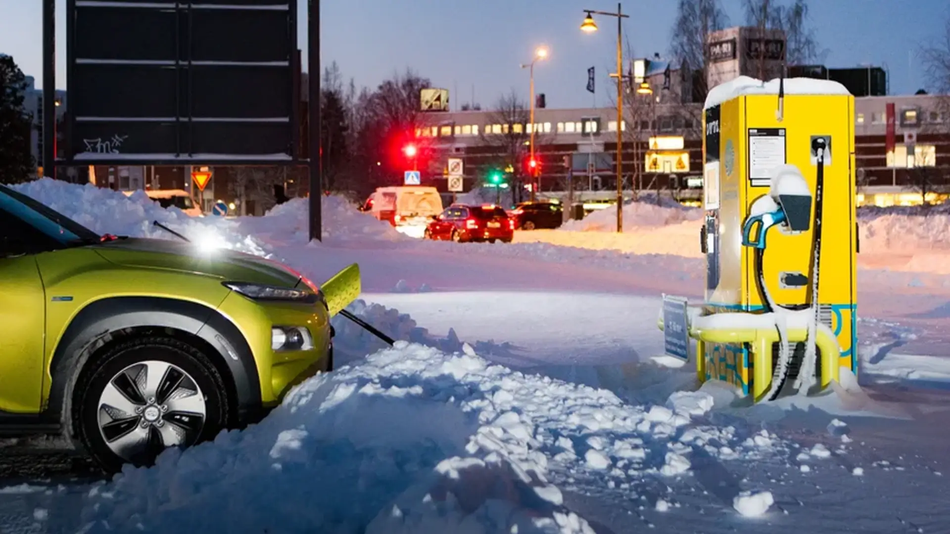 Electric vehicle charging winter cityscape