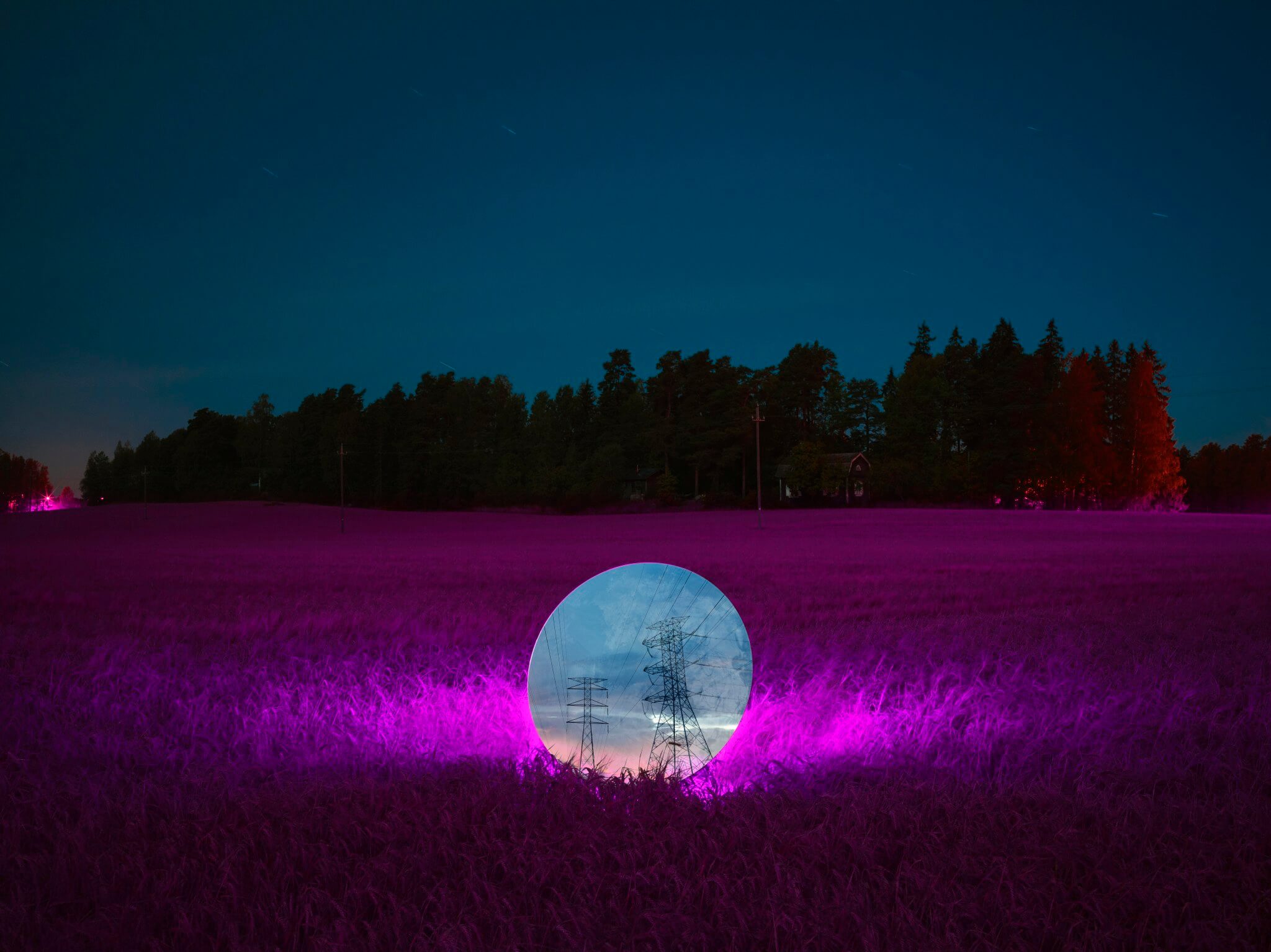 Futuristic glowing orb with electric towers and power lines